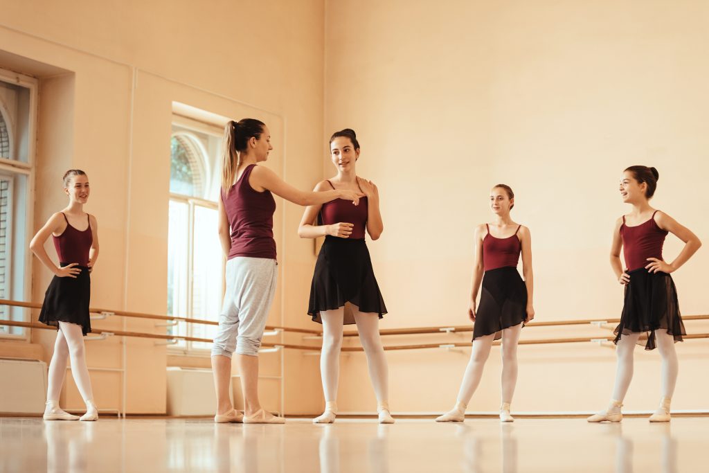 La Fiesta Dance Factory Fun Dance Classes in Sydney NSW Ballet Teacher Talking With Ballerinas During A Class At Dance S
