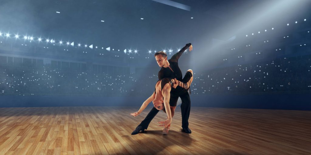 La Fiesta Dance Factory Fun Dance Classes in Sydney NSW Couple Dancers Perform Latin Dance Large Professional Stage Ballroom Dancing
