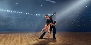 La Fiesta Dance Factory Fun Dance Classes in Sydney NSW Couple Dancers Perform Latin Dance Large Professional Stage Ballroom Dancing